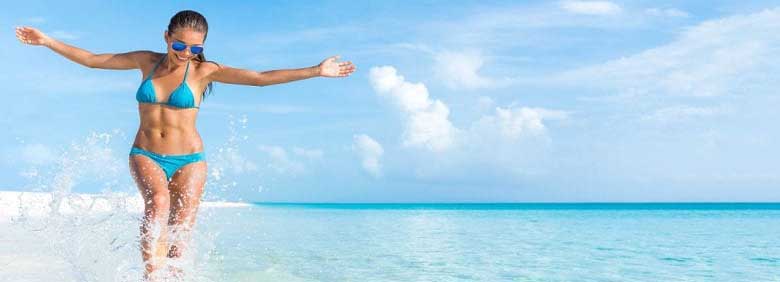 Responsive woman on beach